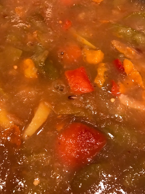 cooked fruit and hot peppers for jelly